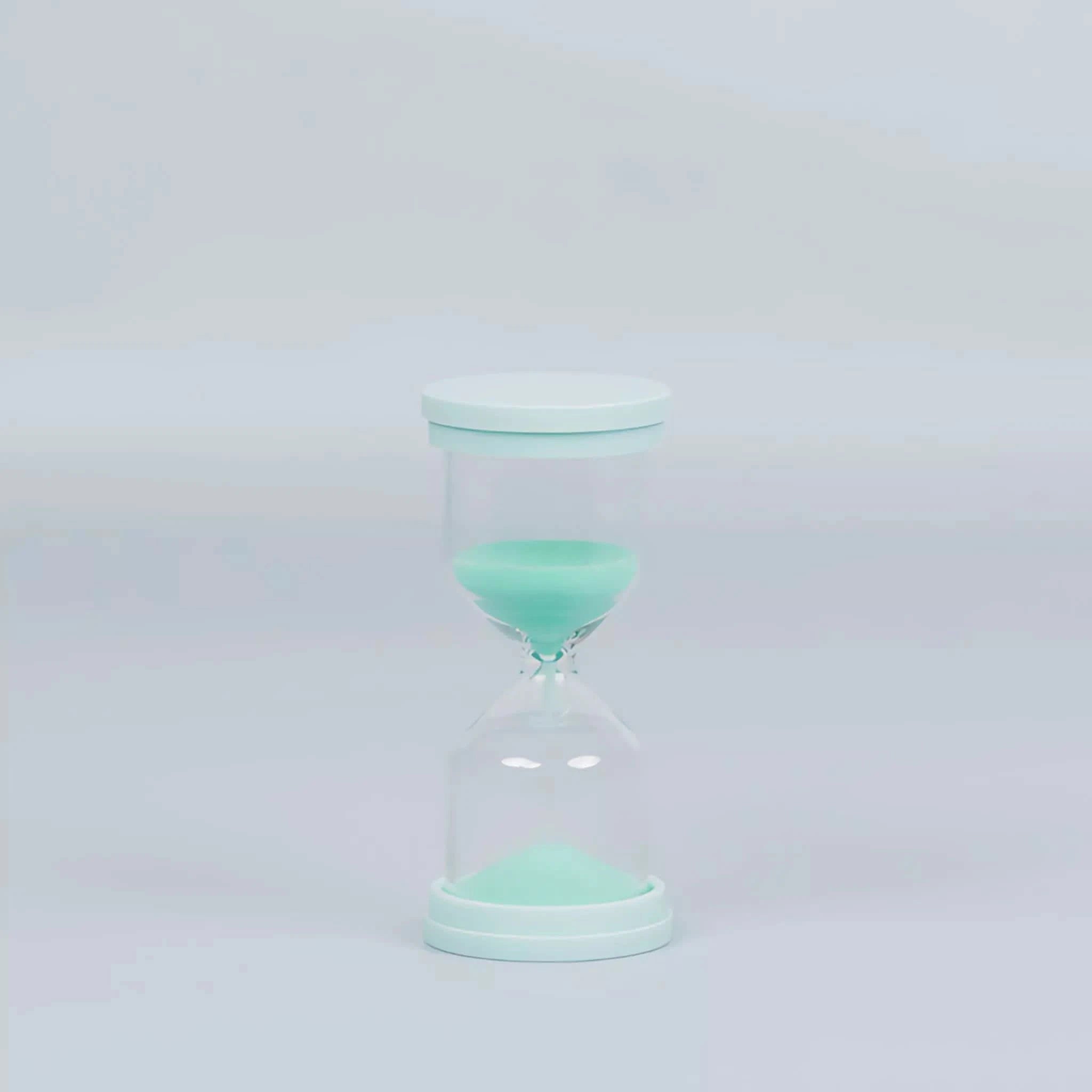 60 Second Skincare Timer in mint color made from sturdy borosilicate glass with sparkly silica, designed for Australian made natural skincare for 7 to 14 year olds. Good Skin Habits Start Early.