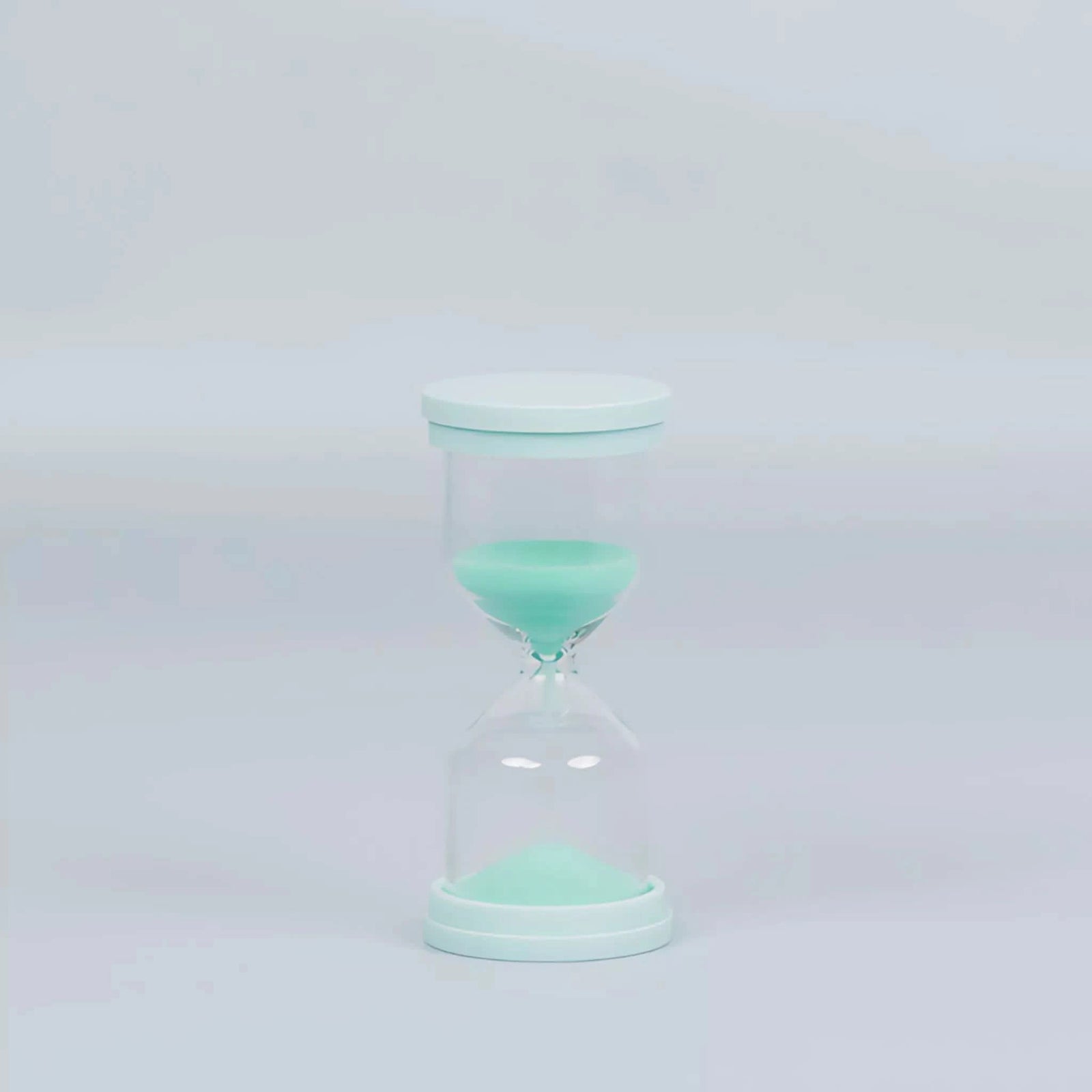 60 Second Skincare Timer in mint color made from sturdy borosilicate glass with sparkly silica, designed for Australian made natural skincare for 7 to 14 year olds. Good Skin Habits Start Early.