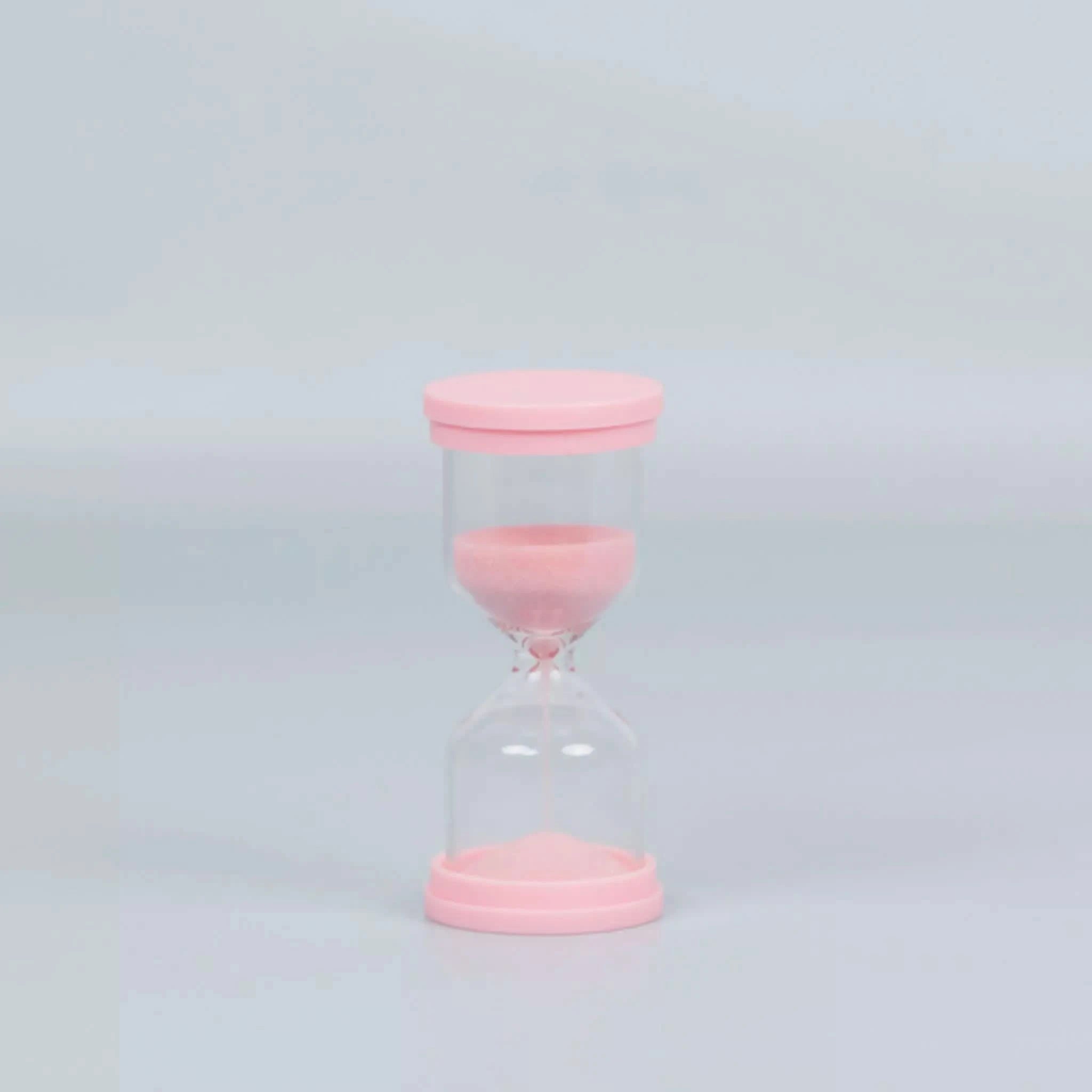 60 Second Skincare Timer with pink borosilicate glass and sparkly silica sand, Australian made for kids aged 7 to 14, promoting good skin habits with gentle, natural skincare.