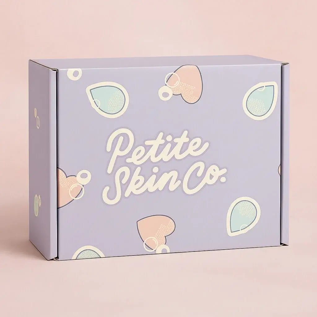 Petite Skin Co. product box with decorative elements on a light pink background