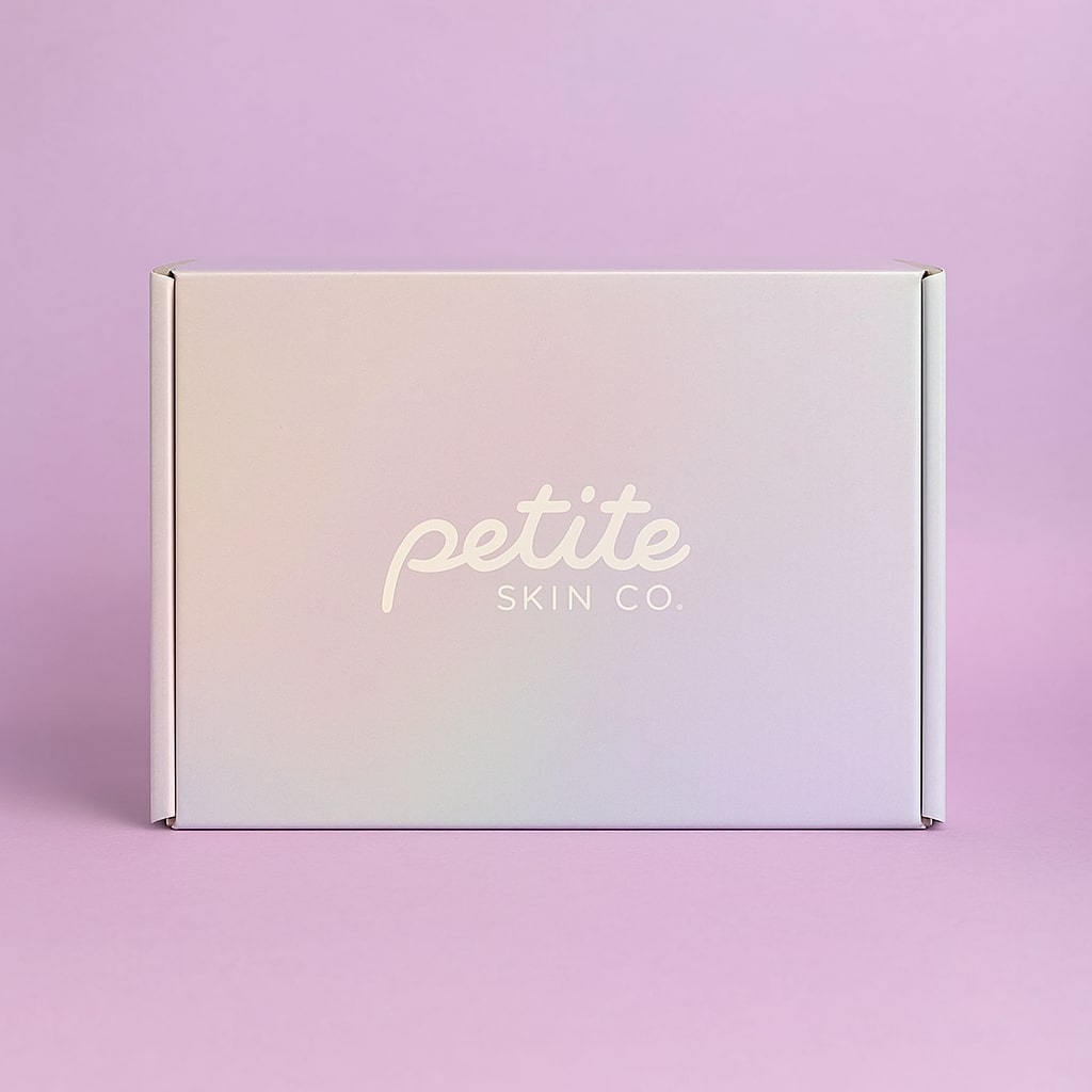 White box with 'petite SKIN CO' branding on a pink background