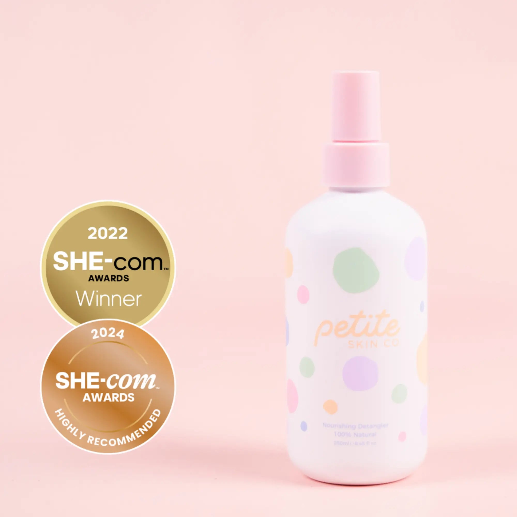 Nourishing Detangler spray bottle with pastel polka dot design on a soft pink background, highlighting Australian made natural hair care for kids aged 7 to 14. Good Skin Habits Start Early.