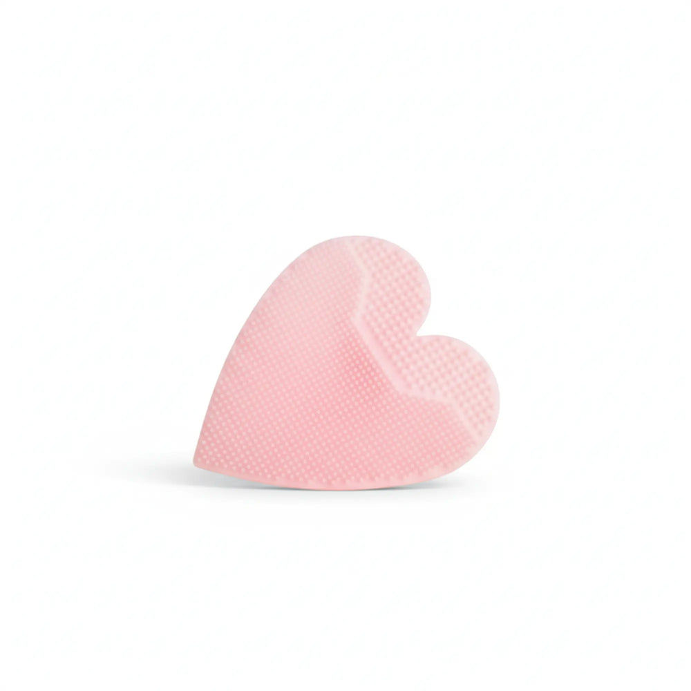 Heart Shaped Skin Buffers by Petite Skin Co., gentle pink silicone exfoliating tool designed for Australian made skincare, perfect for 7 to 14 year olds to build good skin habits early.