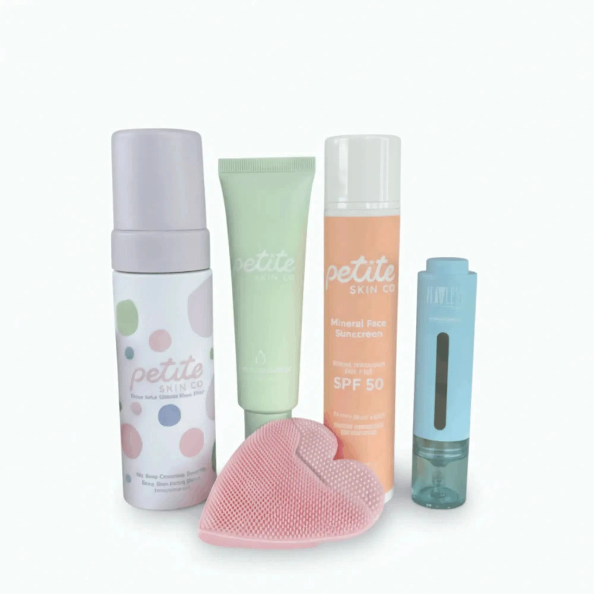 Set of skincare products from the brand 'petite' on a white background