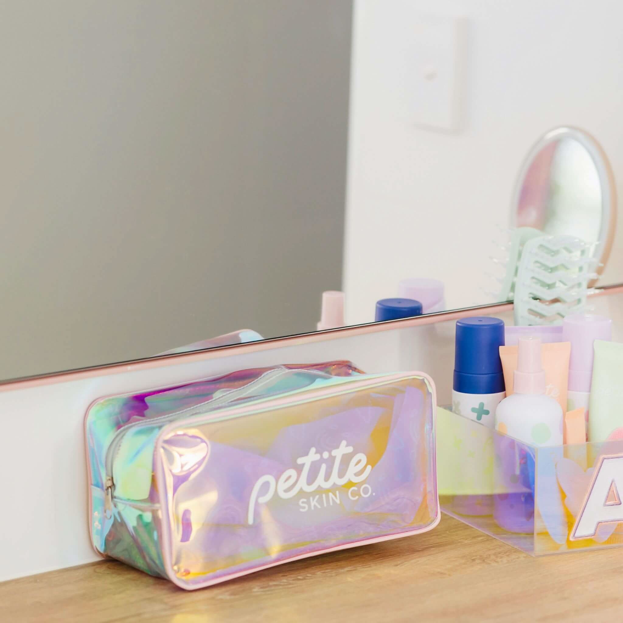 Holographic Skincare Bag by Petite Skin Co. with a roomy interior, perfect for organizing Australian made natural skincare for kids aged 7 to 14, promoting good skin habits.