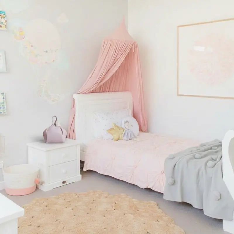 The Lilac Cloud Bag placed on a white bedside table in a soft pink and white bedroom designed for children aged 7 to 14, showcasing Australian made, natural skincare essentials with gentle care for young skin. Good Skin Habits Start Early.