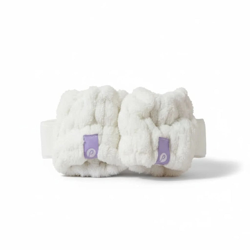Soft white Dry Cuffs designed to create a waterproof barrier at the wrist for kids, Australian made, natural, and suited for the biology of 7 to 14 year old skin. Good Skin Habits Start Early.