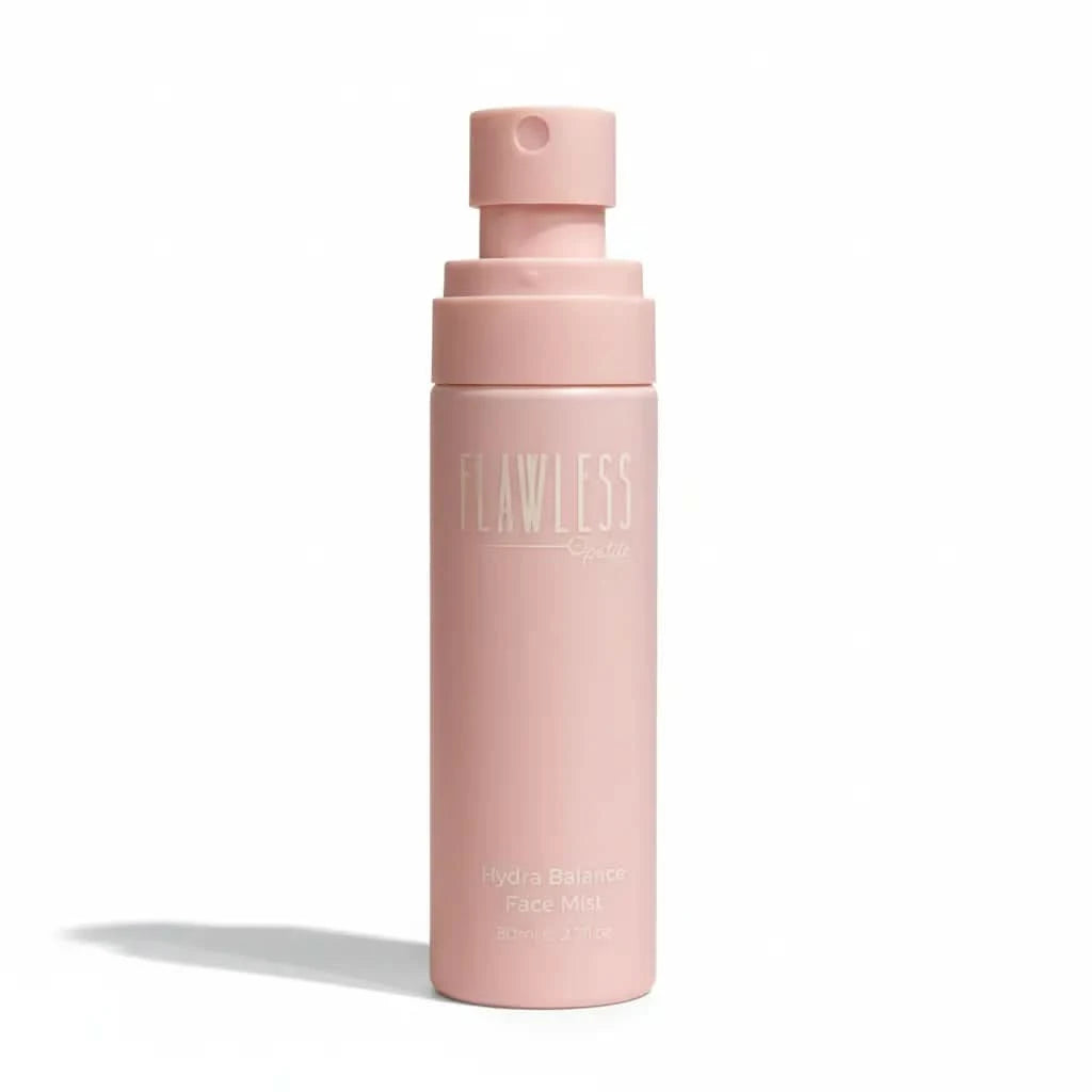 Pink bottle of 'Flawless' face mist on a white background