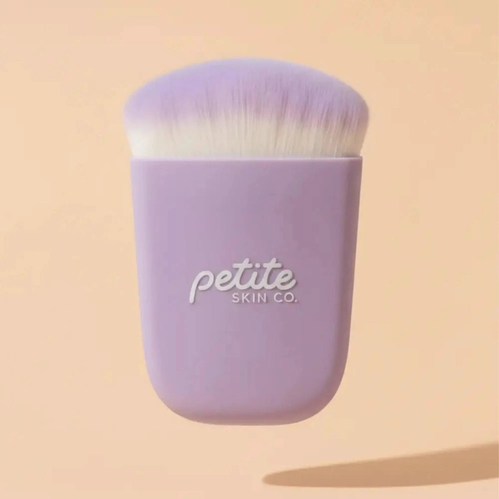 Sunscreen Applicator Brush with soft synthetic bristles and gentle lilac handle, designed by Petite Skin Co., Australian made for the biology of 7 to 14 year old skin. Good Skin Habits Start Early.