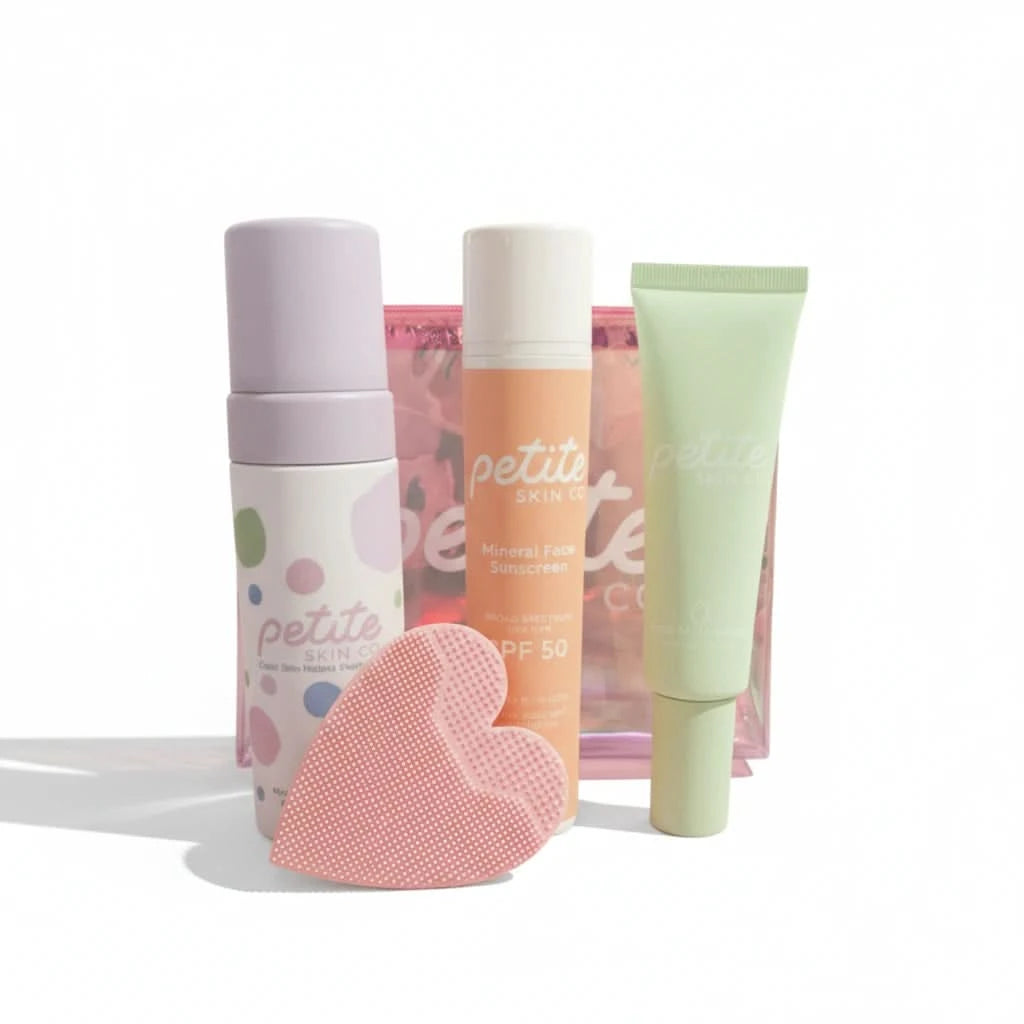 Set of skincare products including a bottle, a tube, and a heart-shaped scrubber on a white background.
