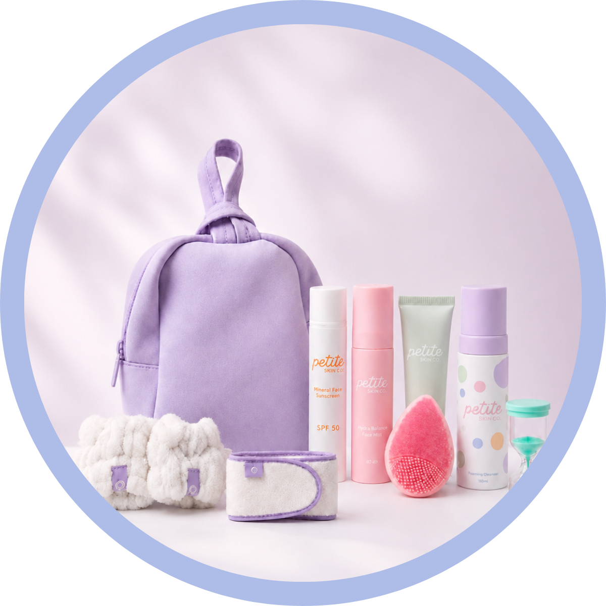 Petite Skin Co. products lined up in front of pink box