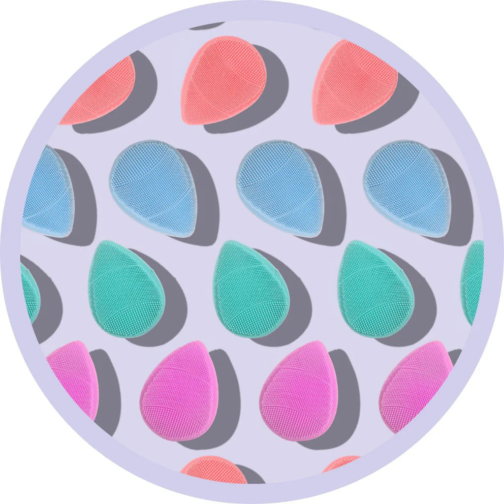 various colours tear shape skin buffers on lilac background