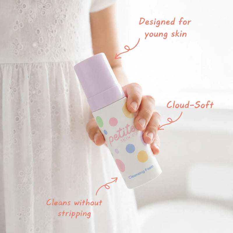 Child holding a bottle of Clear Skin Essentials | Confetti Collection face cleansing foam, Australian made gentle skincare for 7 to 14 year olds promoting good skin habits start early