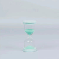 60 Second Skincare Timer in mint color made from sturdy borosilicate glass with sparkly silica, designed for Australian made natural skincare for 7 to 14 year olds. Good Skin Habits Start Early.