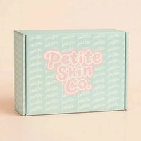 Light blue Petite Skin Co. box with repeating logo pattern and prominent pink logo, representing the Australian made natural skincare brand for 7 to 14 year old skin, titled Is this a Gift? with tagline Good Skin Habits Start Early.