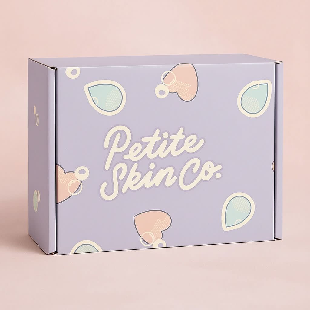 Pastel purple Signature Boxes with playful heart and droplet shapes in pink and teal, designed for gentle Australian made skincare for children aged 7 to 14. Good Skin Habits Start Early.