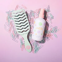 Hairbrush and spray bottle from Good Hair Habits Routine by Petite Skin Co., Australian made natural detangler for 7 to 14 year olds, promoting good skin habits start early.