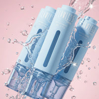 Three pastel blue tubes of Clear Skin Essentials | Confetti Collection from Petite Skin Co. with water splashing around against a soft pink background, highlighting Australian made natural skincare designed for the biology of 7 to 14 year old skin, promoting good skin habits start early.