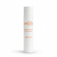 White cylindrical bottle of Petite Skin Co. Mineral Face Sunscreen SPF 50, part of the Clear Skin Essentials | Crosses Collection, Australian made for 7 to 14 year old skin with natural ingredients promoting good skin habits start early.