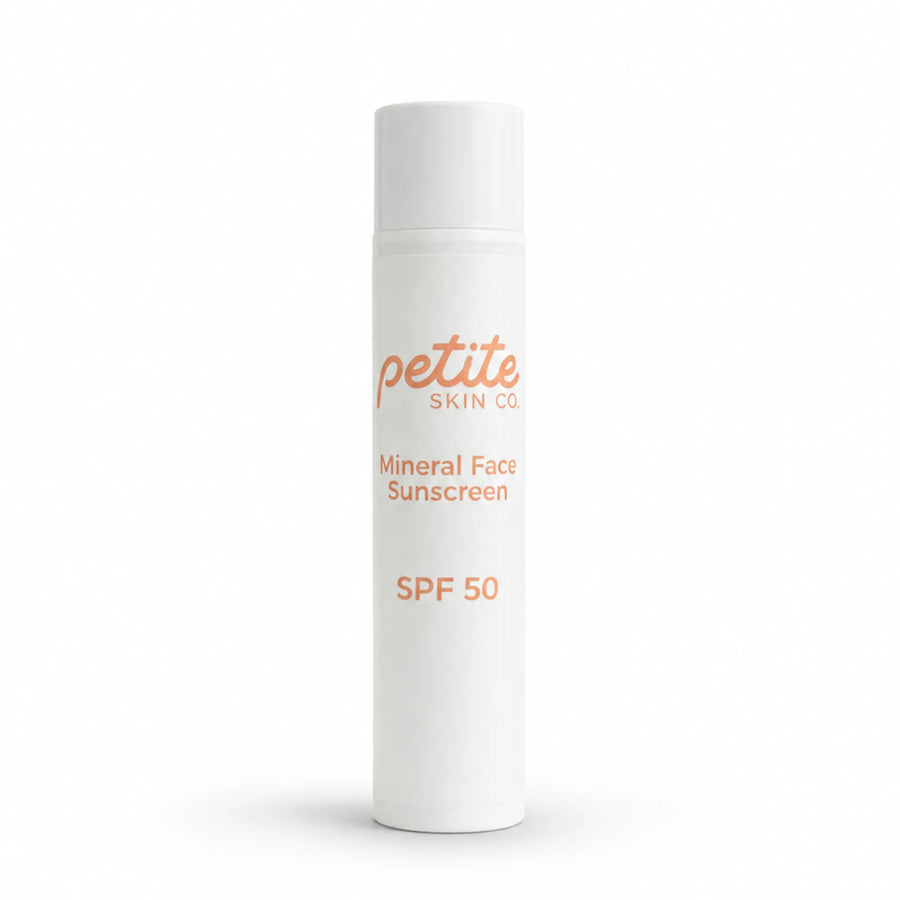 White cylindrical bottle of Petite Skin Co. Mineral Face Sunscreen SPF 50, part of the Clear Skin Essentials | Crosses Collection, Australian made for 7 to 14 year old skin with natural ingredients promoting good skin habits start early.