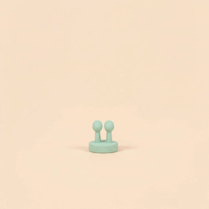 mint hook on a beige background