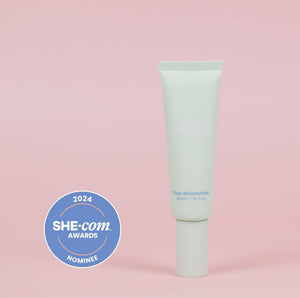 Minimalist tube of face moisturiser for young skin on a pale pink background next to a circular badge indicating 2024 award nomination, reflecting gentle Australian made skincare for tweens.
