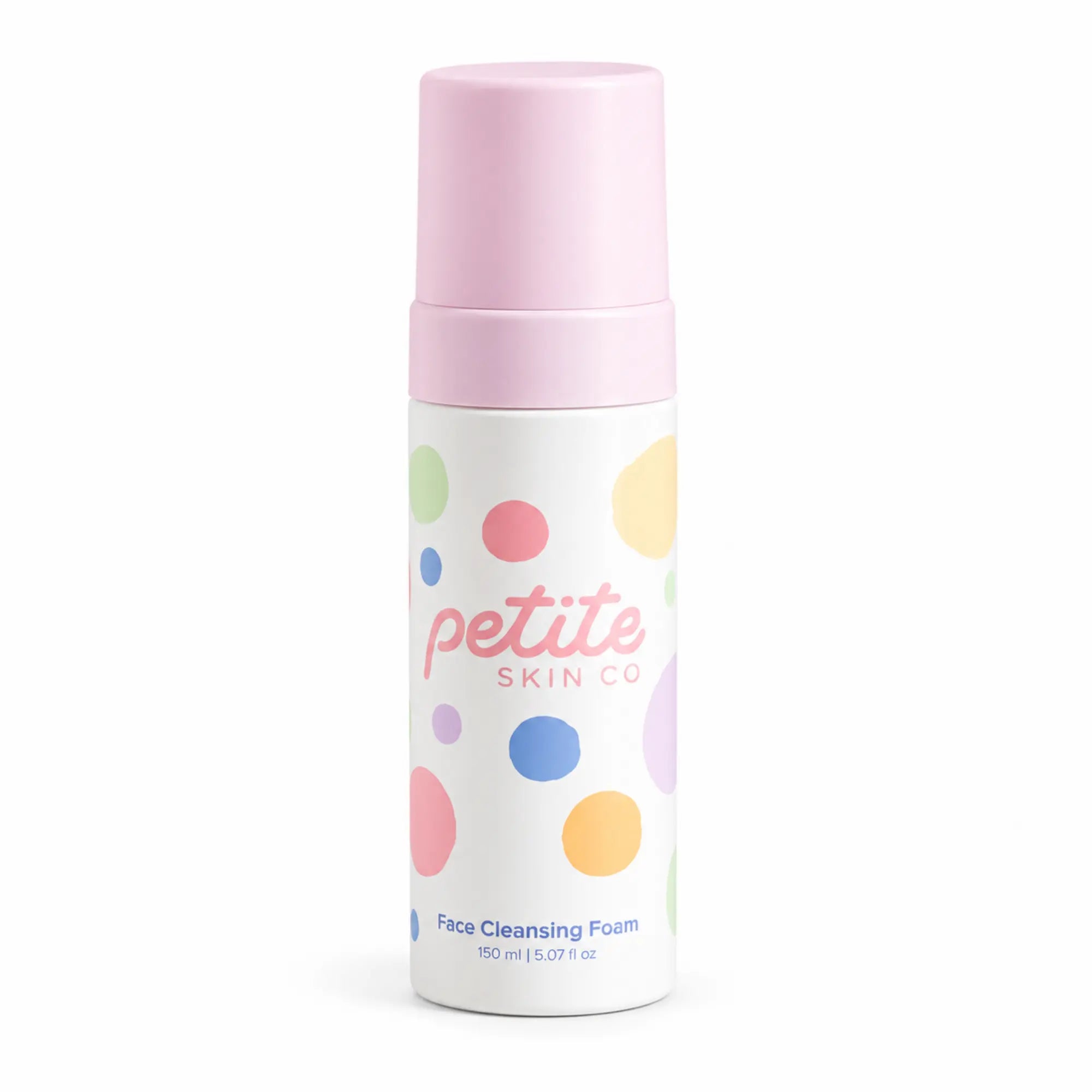 A bottle of Petite Skin Co Face Cleansing Foam with a light pink cap and a white label decorated with colorful polka dots, set against a plain white background.