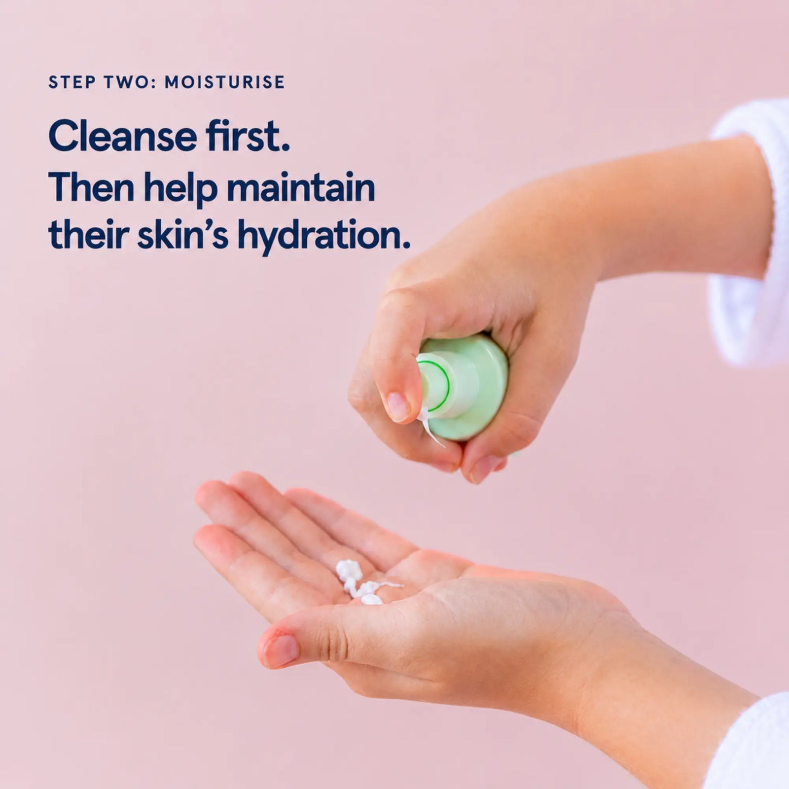 A child's hands dispensing petite skin co. face moisturiser