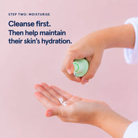 A child's hands dispensing petite skin co. face moisturiser