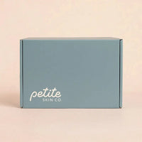 Light teal gift box with Petite Skin Co. logo, representing 