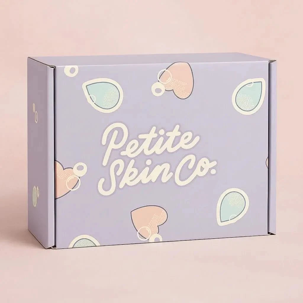 Pastel purple gift box with cute teardrop and heart shapes featuring the text "Petite Skin Co.", representing the "Is this a Gift?" Australian made natural skincare for 7 to 14 year olds, promoting good skin habits start early.