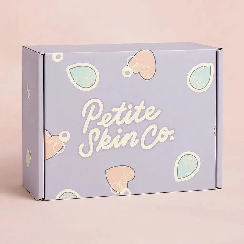 Pastel purple gift box with cute teardrop and heart shapes featuring the text "Petite Skin Co.", representing the "Is this a Gift?" Australian made natural skincare for 7 to 14 year olds, promoting good skin habits start early.